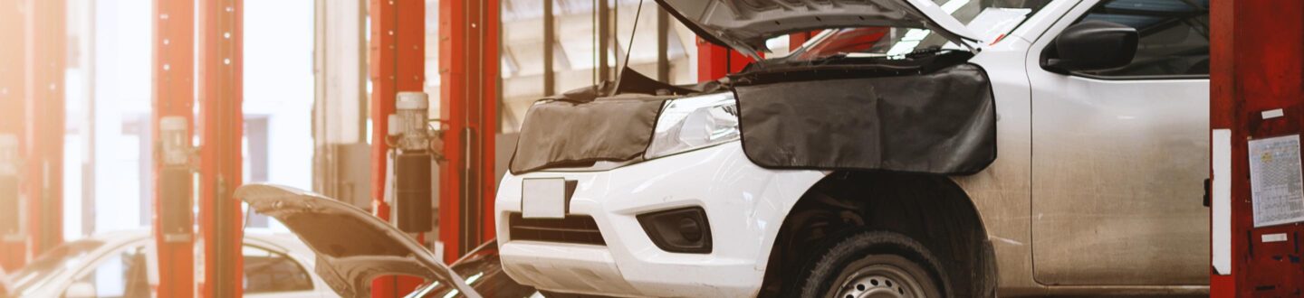 car repair station with soft-focus and over light in the background - Financing Assistance and SBA Support