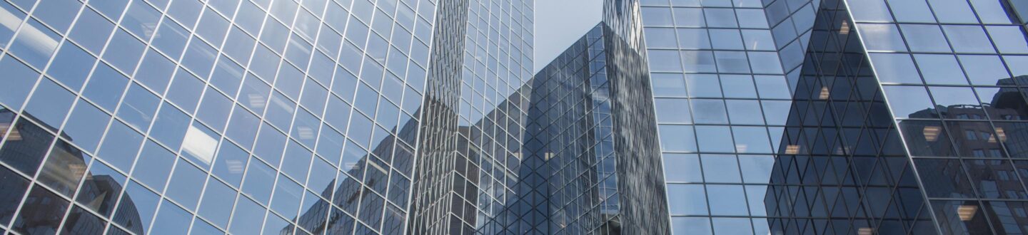 Panoramic and perspective wide angle view to steel light blue background of glass high rise building skyscraper commercial modern city of future. Business concept of successful industrial architecture - Private Equity