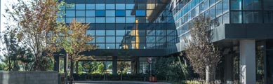 building with mirrored windows - Brady Ware - SRC Real Estate